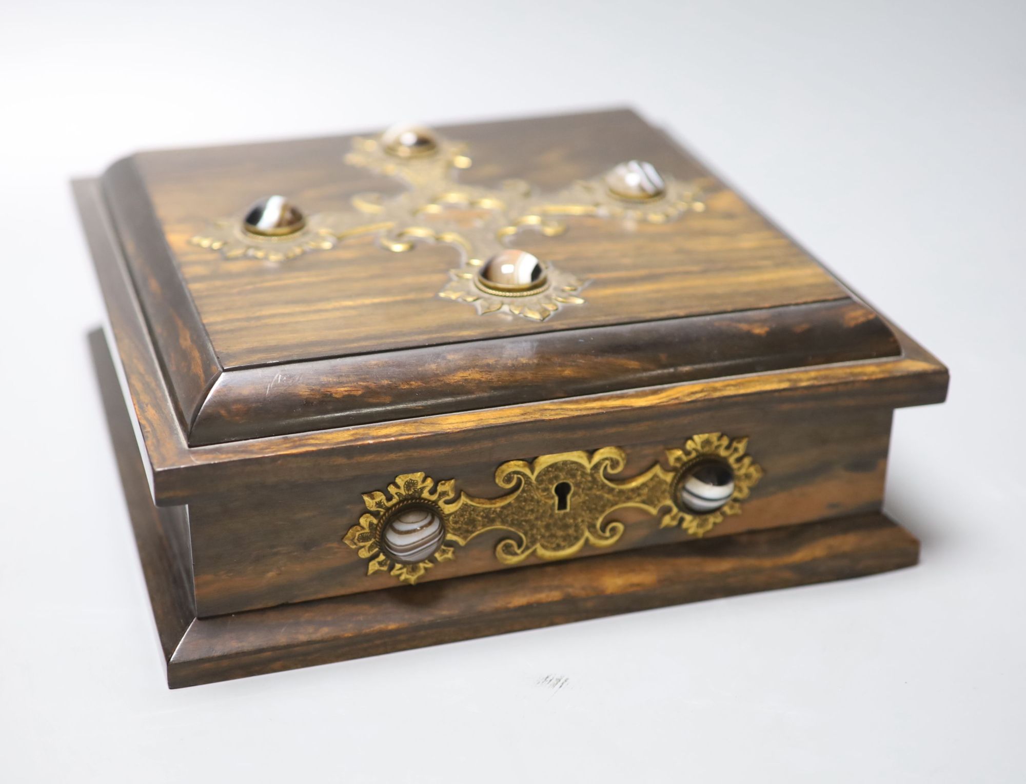 A Victorian coromandel, brass and agate mounted bezique games box, 24.5cm, containing bone and mother of pearl counters, two ivory poin